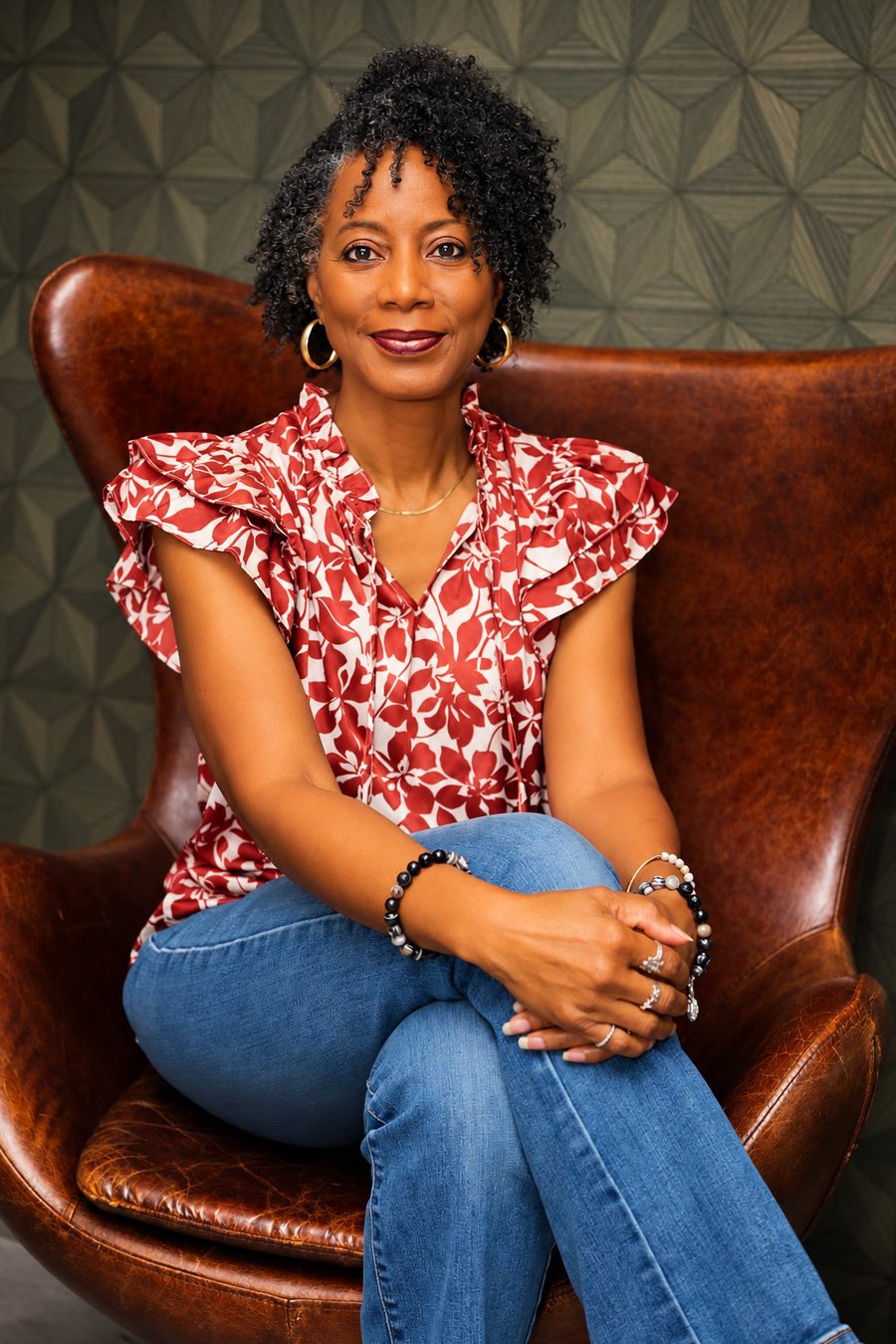 Sharon Jones-Scaife seated in a leather chair